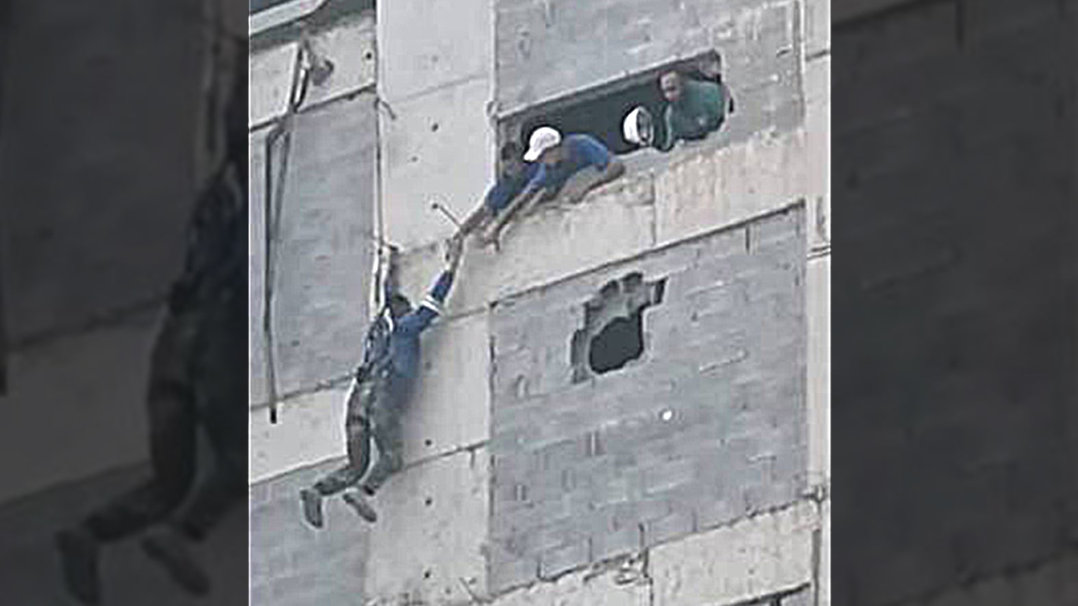 [VÍDEO] Trabalhador fica pendurado a mais de 80 metros